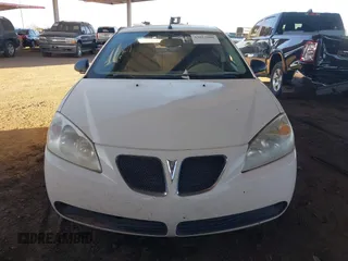 2008 Pontiac G6 1SV Value Leader z VIN 1G2ZF57B584242107, wystawiony jako IAAI lot #42012608 z przebiegiem Nie podano mil oraz . Historia ofert i sprzedaży dostępna na DreamBid. Obrazek 11.