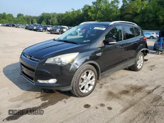 2015 Ford Escape Titanium z VIN 1FMCU9J94FUA39318, wystawiony jako Copart lot #64189505 z przebiegiem 172 783 mil mil oraz Szkoda całkowita • Salvage title. Historia ofert i sprzedaży dostępna na DreamBid. Obrazek 1.