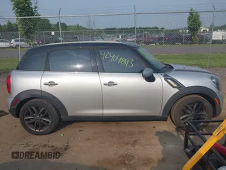2012 MINI Countryman с VIN WMWZB3C5XCWM30143, выставлен на аукционе IAAI как лот 42404893 с пробегом 143 836 миль миль и . История ставок и продаж доступна на DreamBid. Изображение 13.