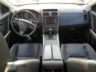 2015 Mazda CX-9 Grand Touring with VIN JM3TB3DV2F0453812, listed as a Copart auction lot 54445115 with 176,067 mi miles and Salvage title. Bid and sale history available at DreamBid. Image 8.