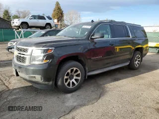 2015 Chevrolet Suburban LT with VIN 1GNSKJKC5FR297522, listed as a Copart auction lot 49248575 with 265,876 mi miles and Clean Title. Bid and sale history available at carsss.com. Image 1.