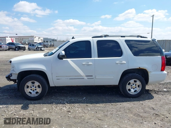 2009 GMC Yukon SLT w/4SA with VIN 1GKFK33059R282974, listed as a IAAI auction lot 42013219 with 209,240 mi miles. Bid and sale history available at carsss.com. Image 14.