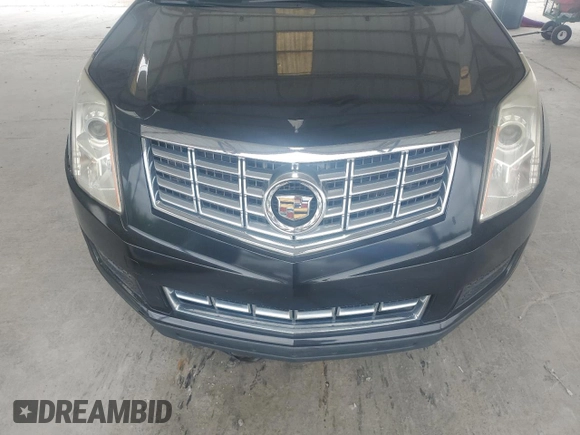 2014 Cadillac SRX z VIN 3GYFNAE39ES558430, wystawiony jako Copart lot #54555645 z przebiegiem 119 524 mil mil oraz Szkoda całkowita • Salvage title. Historia ofert i sprzedaży dostępna na DreamBid. Obrazek 12.