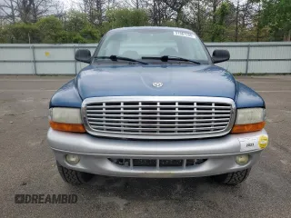 2004 Dodge Dakota SLT z VIN 1D7HG48K04S739865, wystawiony jako Copart lot #57867265 z przebiegiem 214 698 mil mil oraz Tytuł czysty. Historia ofert i sprzedaży dostępna na DreamBid. Obrazek 5.