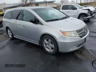 2012 Honda Odyssey Touring with VIN 5FNRL5H99CB055499, listed as a IAAI auction lot 41916534 with 278,435 mi miles. Bid and sale history available at carsss.com. Image 1.