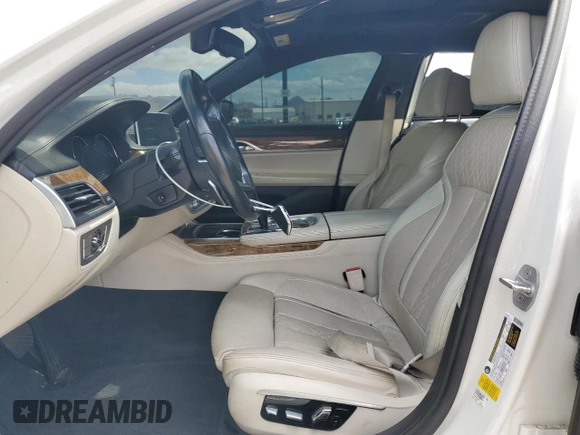 2016 BMW 7 Series 750i z VIN WBA7F0C56GGL99130, wystawiony jako Copart lot #56972905 z przebiegiem 100 556 mil mil oraz Czysty tytuł • Clean title. Historia ofert i sprzedaży dostępna na DreamBid. Obrazek 7.