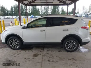 2018 Toyota RAV4 Limited with VIN JTMDFREV4JJ235019, listed as a IAAI auction lot 41896403 with 70,708 mi miles. Bid and sale history available at carsss.com. Image 14.