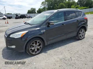 2014 Ford Escape Titanium с VIN 1FMCU0J9XEUA27152, выставлен на аукционе Copart как лот 60246715 с пробегом 182 550 миль миль и Чистый • Clean title. История ставок и продаж доступна на DreamBid. Изображение 1.
