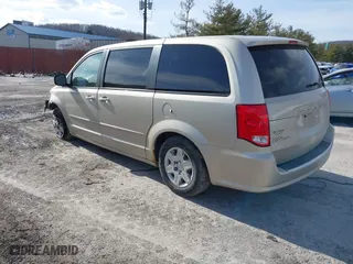 2012 Dodge Grand Caravan SE with VIN 2C4RDGBG3CR385529, listed as a IAAI auction lot 41506810 with 153,300 mi miles. Bid and sale history available at carsss.com. Image 3.