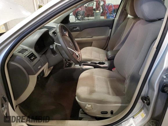2010 Ford Fusion Hybrid with VIN 3FADP0L32AR142750, listed as a Copart auction lot 62395305 with 144,384 mi miles and Salvage title. Bid and sale history available at DreamBid. Image 7.