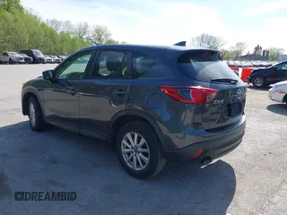 2016 Mazda CX-5 Touring z VIN JM3KE2CY4G0708972, wystawiony jako IAAI lot #42043013 z przebiegiem 157 573 mil mil oraz . Historia ofert i sprzedaży dostępna na DreamBid. Obrazek 3.