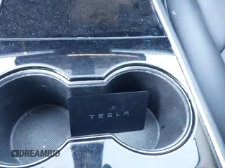 2018 Tesla Model 3 Long Range Battery with VIN 5YJ3E1EA3JF035785, listed as a IAAI auction lot 41986774 with 33,965 mi miles and . Bid and sale history available at DreamBid. Image 11.