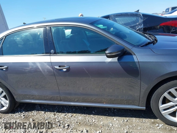2019 Volkswagen Passat 2.0T Wolfsburg Edition with VIN 1VWLA7A38KC003562, listed as a IAAI auction lot 41704839 with 67,313 mi miles. Bid and sale history available at carsss.com. Image 13.