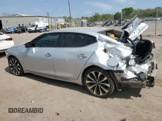 2016 Nissan Maxima SR z VIN 1N4AA6AP8GC403562, wystawiony jako Copart lot #55181945 z przebiegiem 148 608 mil mil oraz Szkoda całkowita • Salvage title. Historia ofert i sprzedaży dostępna na DreamBid. Obrazek 2.