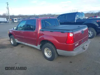 2001 Ford Explorer Sport Trac z VIN 1FMZU77E31UA72225, wystawiony jako IAAI lot #41784584 z przebiegiem 202 195 mil mil oraz . Historia ofert i sprzedaży dostępna na DreamBid. Obrazek 3.