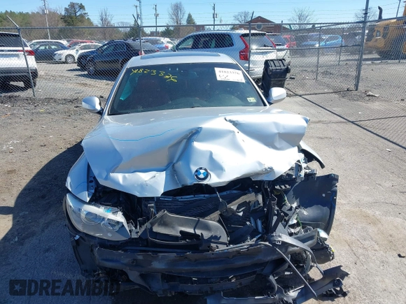 2013 BMW 3 Series 335i xDrive with VIN WBAKF9C56DE860199, listed as a IAAI auction lot 41823376 with Not provided miles and . Bid and sale history available at DreamBid. Image 12.