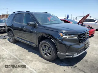 2025 Honda Pilot TrailSport with VIN 5FNYG1H62SB101798, listed as a Copart auction lot 55340585 with 1,065 mi miles and Salvage title. Bid and sale history available at DreamBid. Image 4.