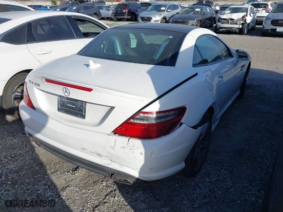 2016 Mercedes-Benz SLK with VIN WDDPK3JA8GF125343, listed as a IAAI auction lot 41428898 with 56,454 mi miles. Bid and sale history available at carsss.com. Image 4.