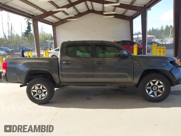 2017 Toyota Tacoma SR5 with VIN 3TMCZ5AN4HM088974, listed as a IAAI auction lot 42047358 with 153,743 mi miles and . Bid and sale history available at DreamBid. Image 14.
