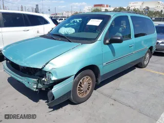 1998 Ford Windstar Wagon GL with VIN 2FMDA5140WBB42090, listed as a IAAI auction lot 41973304 with 68,809 mi miles. Bid and sale history available at carsss.com. Image 2.