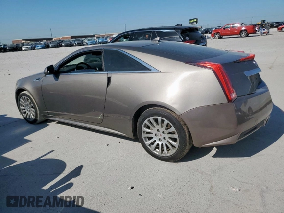 2012 Cadillac CTS Performance z VIN 1G6DJ1E35C0138308, wystawiony jako Copart lot #52984375 z przebiegiem 134 881 mil mil oraz Czysty tytuł • Clean title. Historia ofert i sprzedaży dostępna na DreamBid. Obrazek 2.
