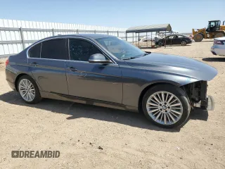 2013 BMW 3 Series 328i with VIN WBA3C1C56DF437440, listed as a Copart auction lot 61389475 with 122,736 mi miles and Salvage title. Bid and sale history available at DreamBid. Image 4.