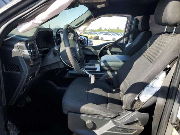 2023 Ford F-150 XL with VIN 1FTEW1CP4PKD21685, listed as a Copart auction lot 54992615 with 27,252 mi miles and Salvage title. Bid and sale history available at DreamBid. Image 7.