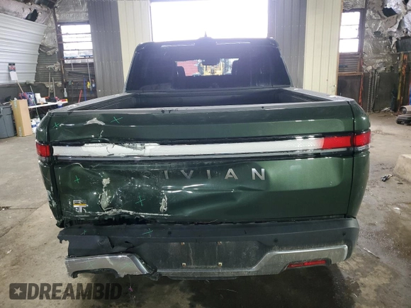 2023 Rivian R1T Adventure with VIN 7FCTGAAA0PN024165, listed as a Copart auction lot 84265444 with Not Provided miles and Salvage Title. Bid and sale history available at carsss.com. Image 6.