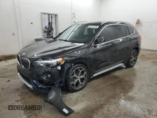 2018 BMW X1 sDrive28i with VIN WBXHU7C34J5L08334, listed as a Copart auction lot 52177725 with 81,074 mi miles and Salvage Title. Bid and sale history available at carsss.com. Image 1.