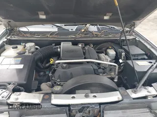 2004 GMC Envoy SLE with VIN 1GKDT13S142219365, listed as a IAAI auction lot 41612594 with 72,292 mi miles. Bid and sale history available at carsss.com. Image 10.