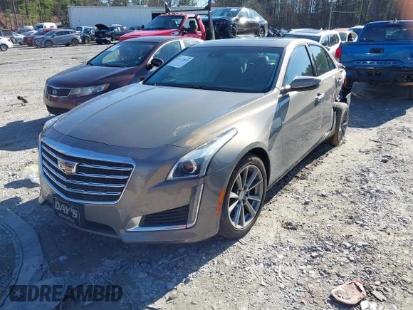 2017 Cadillac CTS Luxury RWD with VIN 1G6AR5SS1H0155564, listed as a IAAI auction lot 41232053 with 67,792 mi miles and . Bid and sale history available at DreamBid. Image 2.