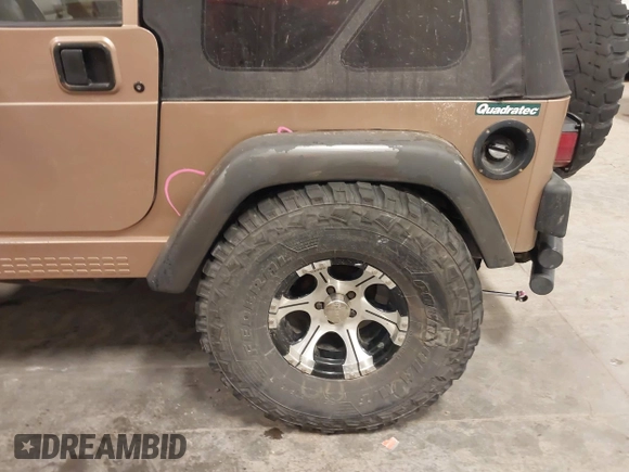 2000 Jeep Wrangler Sahara with VIN 1J4FA59S2YP740431, listed as a IAAI auction lot 41313079 with 183,989 mi miles. Bid and sale history available at carsss.com. Image 6.