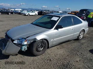 1999 Honda Civic EX with VIN 1HGEJ8242XL025414, listed as a IAAI auction lot 41736378 with 206,342 mi miles. Bid and sale history available at carsss.com. Image 17.