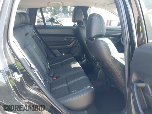 2025 Mazda CX-50 S Preferred with VIN 7MMVABBM9SN301063, listed as a IAAI auction lot 42801040 with 23,696 mi miles and . Bid and sale history available at DreamBid. Image 8.