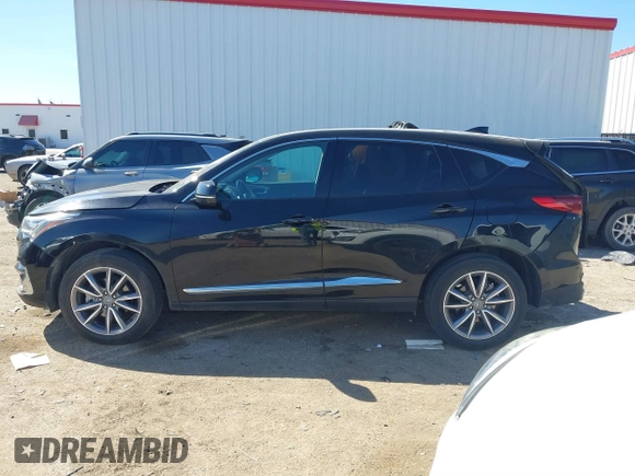 2021 Acura RDX Technology with VIN 5J8TC1H50ML014819, listed as a IAAI auction lot 41684916 with 46,720 mi miles and . Bid and sale history available at DreamBid. Image 14.