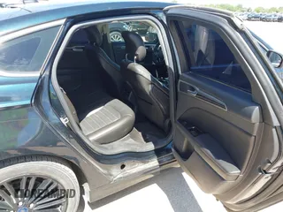 2014 Ford Fusion SE with VIN 3FA6P0H91ER298077, listed as a IAAI auction lot 42221110 with 244,165 mi miles and . Bid and sale history available at carsss.com. Image 8.