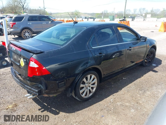 2011 Ford Fusion SE with VIN 3FAHP0HA6BR153888, listed as a IAAI auction lot 42009992 with 213,676 mi miles. Bid and sale history available at carsss.com. Image 4.