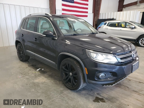 2012 Volkswagen Tiguan S with VIN WVGBV7AX9CW541088, listed as a Copart auction lot 49881585 with 141,540 mi miles and Salvage Title. Bid and sale history available at DreamBid. Image 4.