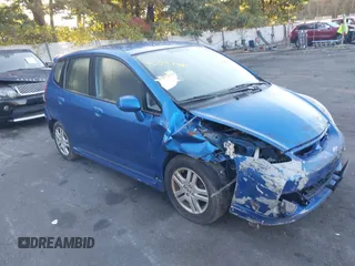 2007 Honda Fit Sport z VIN JHMGD38657S043551, wystawiony jako IAAI lot #40553481 z przebiegiem 138 979 mil mil oraz . Historia ofert i sprzedaży dostępna na DreamBid. Obrazek 1.
