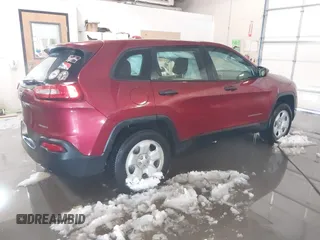 2014 Jeep Cherokee Sport with VIN 1C4PJMABXEW125420, listed as a IAAI auction lot 41573107 with 125,546 mi miles. Bid and sale history available at carsss.com. Image 4.