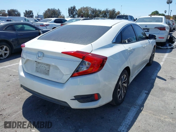 2016 Honda Civic Sedan EX with VIN 2HGFC2F75GH537133, listed as a IAAI auction lot 42081927 with 130,917 mi miles. Bid and sale history available at carsss.com. Image 4.