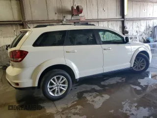 2017 Dodge Journey SXT with VIN 3C4PDCBG0HT572165, listed as a Copart auction lot 56673495 with Not provided miles and Salvage title. Bid and sale history available at DreamBid. Image 3.