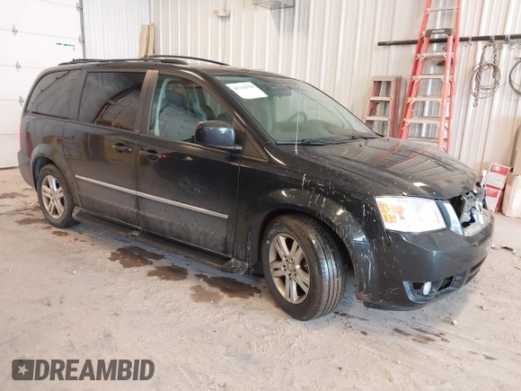 2010 Dodge Grand Caravan Crew with VIN 2D4RN6DX1AR438135, listed as a IAAI auction lot 41734378 with 57,041 mi miles and . Bid and sale history available at DreamBid. Image 1.