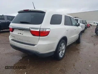 2012 Dodge Durango SXT with VIN 1C4RDHAG5CC308449, listed as a IAAI auction lot 41522856 with 111,284 mi miles and . Bid and sale history available at DreamBid. Image 4.