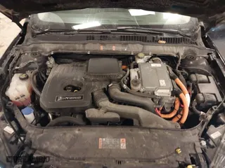 2020 Ford Fusion Hybrid Titanium with VIN 3FA6P0RU8LR141355, listed as a IAAI auction lot 41417807 with 61,288 mi miles. Bid and sale history available at carsss.com. Image 10.