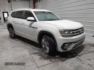 2019 Volkswagen Atlas SE z VIN 1V2XR2CA0KC595596, wystawiony jako IAAI lot #41410019 z przebiegiem 103 336 mil mil oraz . Historia ofert i sprzedaży dostępna na DreamBid. Obrazek 1.