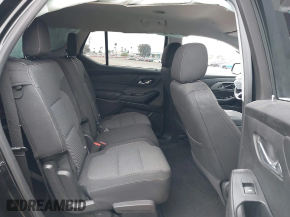 2018 Chevrolet Traverse LT Cloth z VIN 1GNERGKW4JJ127889, wystawiony jako IAAI lot #42368681 z przebiegiem 65 438 mil mil oraz . Historia ofert i sprzedaży dostępna na DreamBid. Obrazek 8.