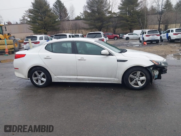 2015 Kia Optima LX with VIN KNAGM4A70F5571034, listed as a IAAI auction lot 41734211 with 214,948 mi miles. Bid and sale history available at carsss.com. Image 14.