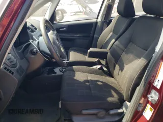 2011 Suzuki SX4 LE with VIN JS2YC5A2XB6302991, listed as a Copart auction lot 68815864 with 82,464 mi miles and Salvage Title. Bid and sale history available at carsss.com. Image 7.