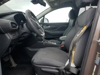 2019 Hyundai Santa Fe SE z VIN 5NMS2CAD0KH123337, wystawiony jako Copart lot #53883405 z przebiegiem 79 456 mil mil oraz Szkoda całkowita • Salvage title. Historia ofert i sprzedaży dostępna na DreamBid. Obrazek 7.